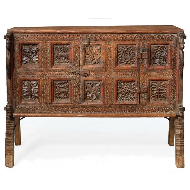 This stunning antique dowry chest from Gujarat, circa 1880, showcases the unique style of this Northern Indian province....
