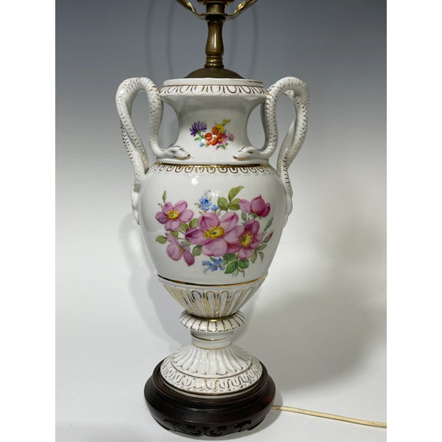 Late 19th century Meissen porcelain snake handled vase fitted as lamp, The classical baluster form lamp is hand painted in...