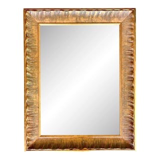 Gilt Wood Wall Mirror With Texturized Detail For Sale