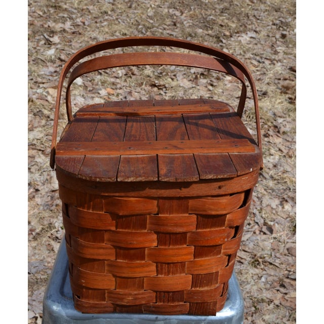 A wonderfully fun picnic basket in a reddish-brown stain. Very usable for a lovely picnic or for decorative storage. The...