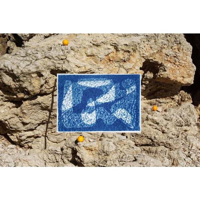 This is an exclusive handprinted unique cyanotype that takes its inspiration from the mid-century modern shapes. It's made...