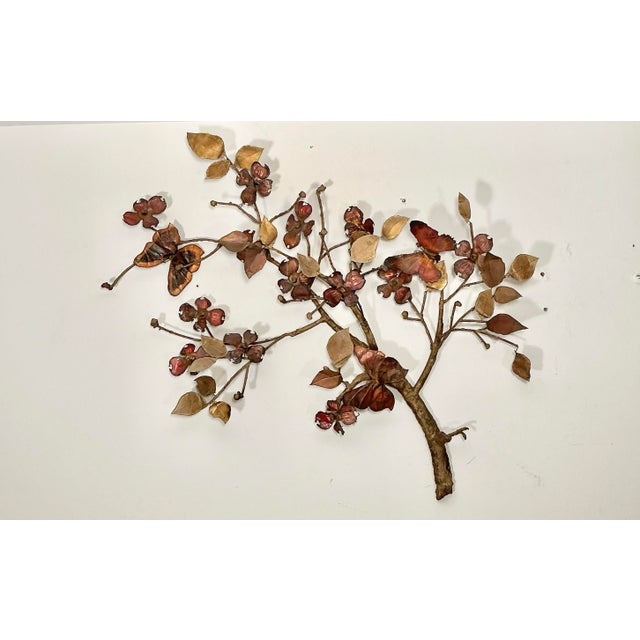 This is a vintage 1960's hand-made Brutalist wall art sculptured solid copper and brass tree branch, in the style of...