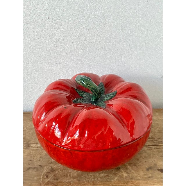 This vibrant 1960s Italian majolica tureen is a masterful example of trompe l’oeil ceramic artistry, meticulously designed...