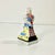 From the high-quality porcelain factory of Herend out of Hungary, we have a hand painted folk dancer figurine. The female...