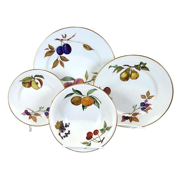 A table set for poetry. This exquisite 32-piece collection from Royal Worcester’s beloved Evesham Gold line features hand-...