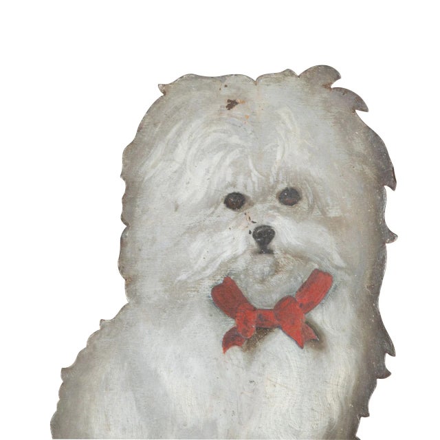 A rare c19th decorated tole dummy board constructed as stick stand, depicting a terrier with red ribbon collar, seated...