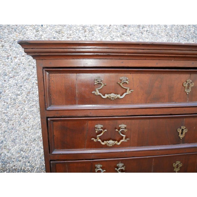 Antique walnut chest of drawers. 18th century. Antique solid walnut chest of drawers, veneered on the drawers. Early 18th...