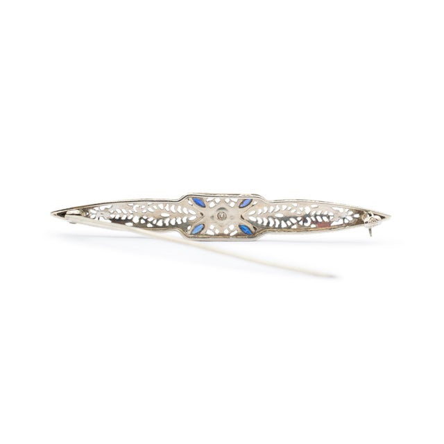 Metal Type: 14K White Gold Length: 2.25 Inches Width: 8.35 mm Weight: 3.64 grams Filigreed 14K white gold diamond and...