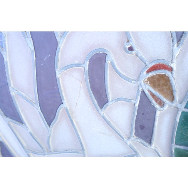 Beautiful antique swan lake stained glass scene. Two separate panels, but have been soldered into a metal frame so that...