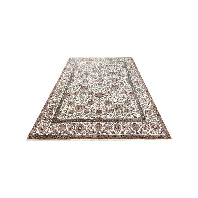 Enhance your living spaces or dining rooms with this one-of-a-kind 9x12 Mughal Area Rug, which blends soft ivory, maroon,...