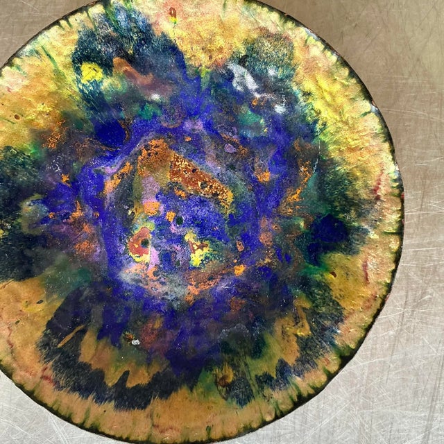 Add a touch of eclectic charm to your home with this Vintage Boho Enamel Bowl. Showcasing classic American style, this...