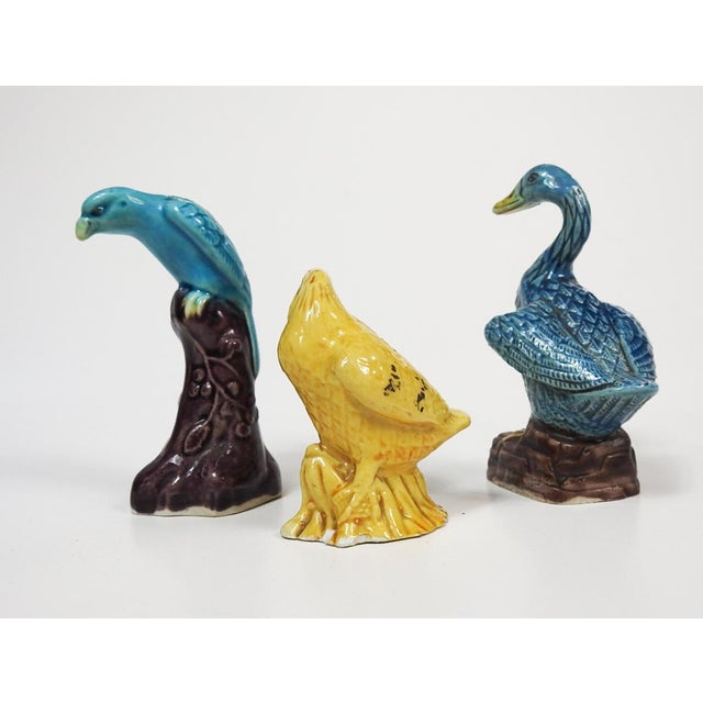 Group of 3 small Chinese export porcelain birds, parrot and duck in turquoise and yellow glaze. Slightly different poses...
