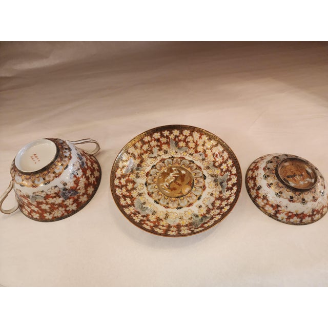 Incredibly delicate and beautiful fine bone China, this very rare set is signed on the bottom and hand painted, Dating to...