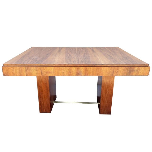 Crafted in the Art Deco aesthetic, this walnut Dining Table or Desk embodies the avant-garde style akin to Charles...