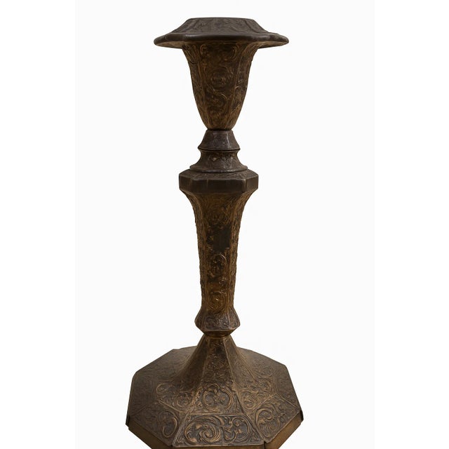 Antique pair of intricately cast spelter table lamps, richly detailed with scrolling foliate motifs and finished in bronze...