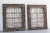 A very unique complimentary set of 2 Indonesian architectural art 'window' panels with dark wood frame with carvings of...
