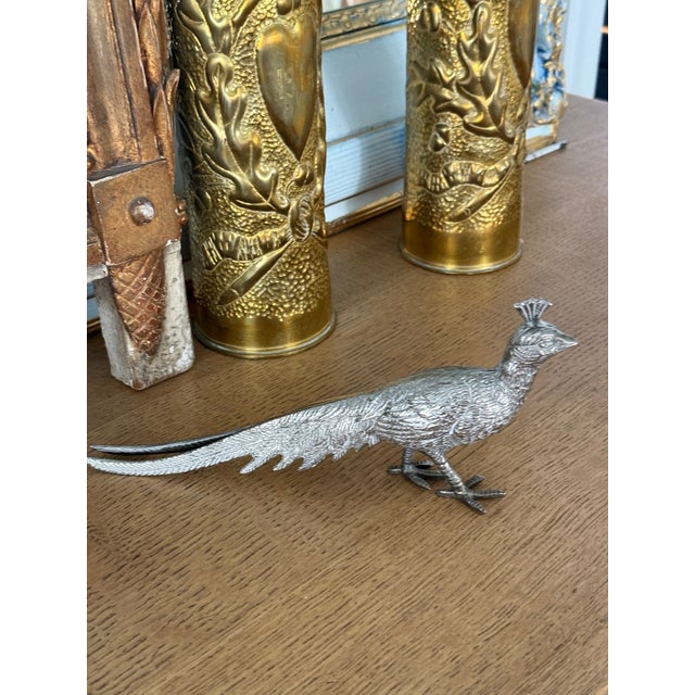 A charming pair of antique French pheasant figurines in a more petite scale, beautifully cast with crisp feather detailing...