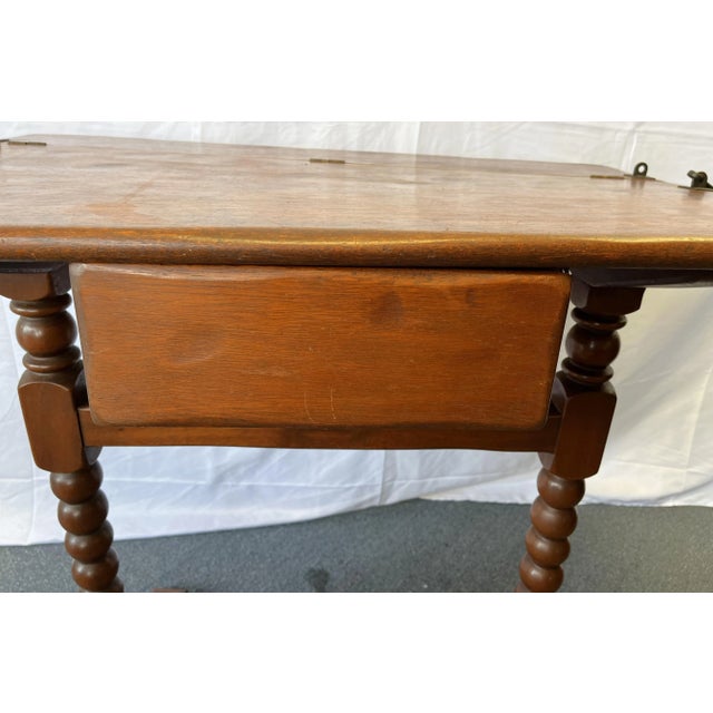 Very unique antique ship's navigation table from the early 1900's. It's handmade of solid wood with barley twist legs and...
