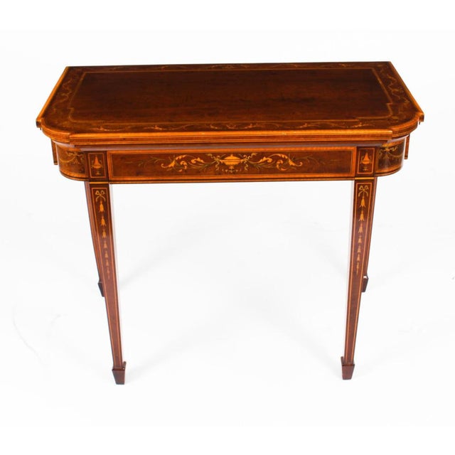 This is a fabulous antique Victorian mahogany, satinwood and marquetry games table in the manner of Edwards & Roberts,...