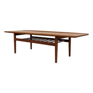 Mid Century Modern Coffee Table by Grete Jalk, C. 1960’s | Upturned Edges & Slatted Magazine Rack For Sale