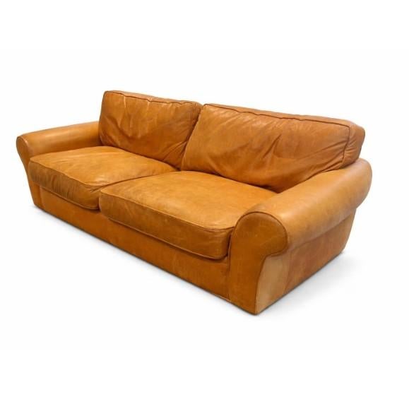 DESCRIPTION: Rich caramel leather with a natural, broken-in patina that only gets better over time. Clean lines, wide...