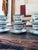 A beautiful 13-piece vintage Crown Staffordshire fine bone china tea set in the elegant Lyric Tunis Blue pattern, made in...