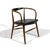 This beautiful walnut armchair was made in Silver City, North Carolina by the Boling Chair Co. however, with its subtle...