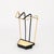 Wonderful Mid-Century umbrella stand in brass, black enameled metal, and cream enameled metal. This stylish and unique...