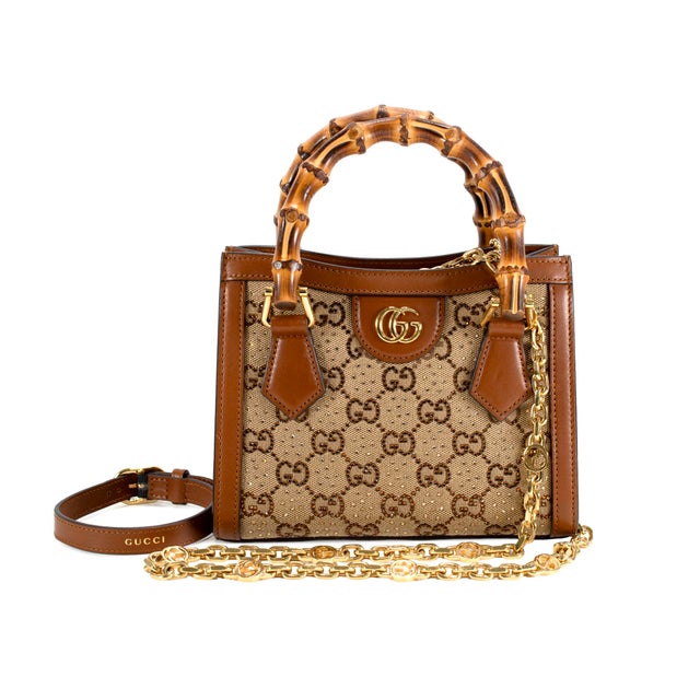Brand: Gucci Gender: Ladies Length: 7.90 inches Height: 6.30 inches Width: 3.90 inches Weight: 650.75 grams Gucci Diana...