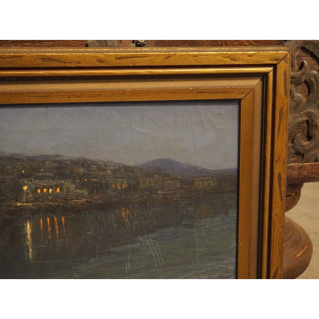 A beautiful rendering of an Italian Mediterranean village at night, this oil on canvas was painted by Nicola Ascione. The...