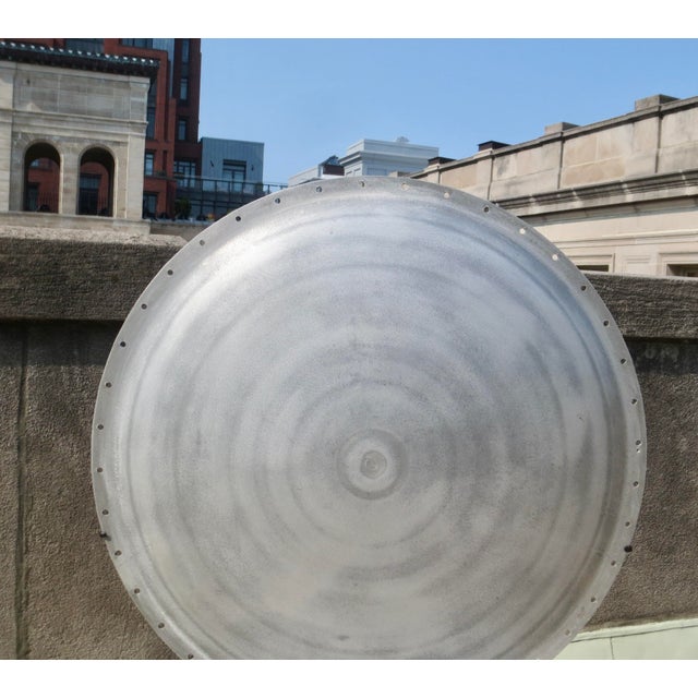 Industrial Aluminum Disk museum mounted to steel. A true circle, standing alone, the disk has a slight rise in the center,...