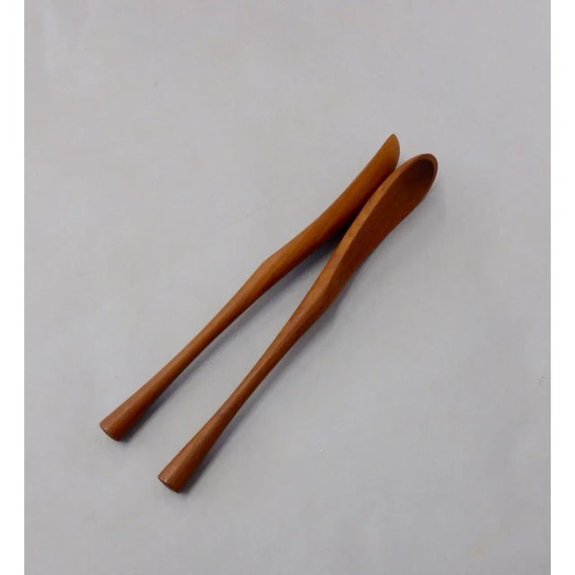 Pair of Jens Quistgaard Danish teak salad servers. Part of a recently acquired large collection.