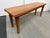 Design Plus Gallery presents a solid recycled teak bench purchased from Wooden Duck, featuring a warm natural patina,...