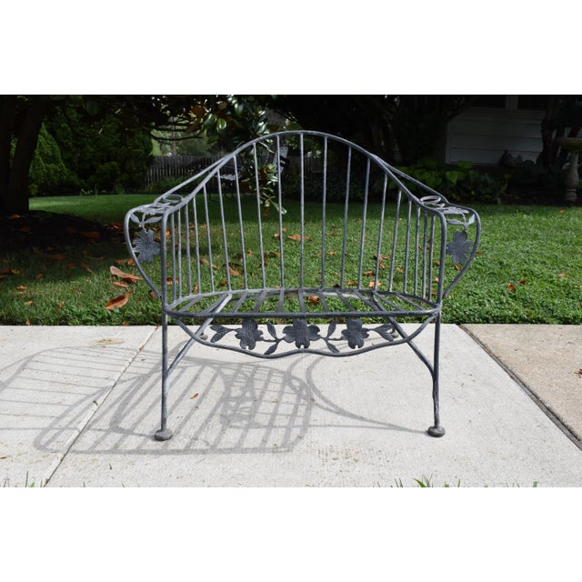 An unusual wrought Iron Faux Bois Patio or Garden chair in the form of true Dogwood. Very heavy solid construction with...