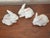 Charming trio of small white bunny rabbits with pink ears and eyes. Perfect spring decor. Please see condition details...