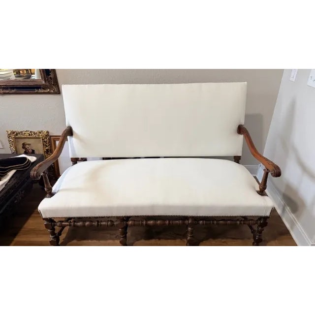 Antique sofa, maybe English or Italian, purchase from C & W Antiques in Grand Prairie, Texas. Eight leg supports. Has be...
