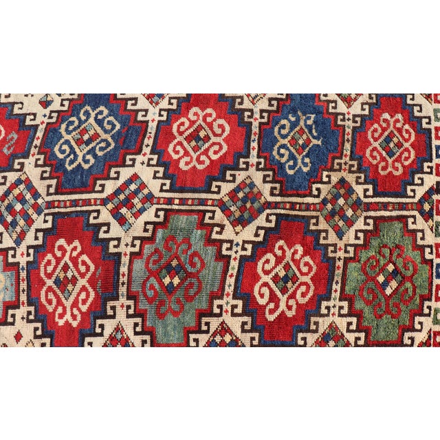 Antique Moghan Kazak Rug Showcasing Bold Geometric Medallions 4'6 X 6' For Sale - Image 9 of 11