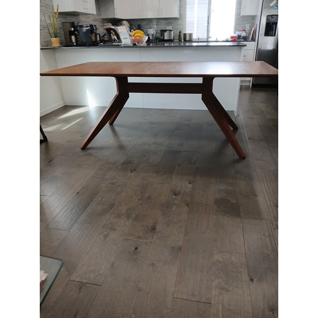 The table is in excellent condition, like new. There is no sign of use of the table. Beautiful walnut table. Enough for...