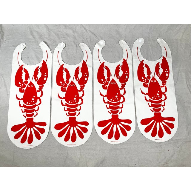 Vintage set of 4 hand printed lobster bibs. Extra long cotton canvas bibs with graphic lobsters printed on them. Made by...