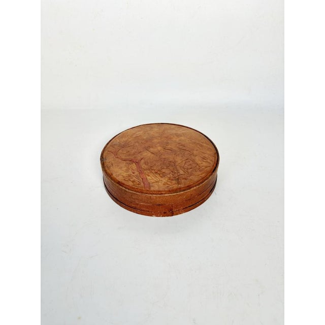 A French decorative box from the 1960s, crafted from leather, exemplifies the understated elegance and artisanal quality...