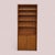 A tall vintage oak bookcase with an exceptionally useful 12.75-inch depth, adjustable open shelving and concealed storage...