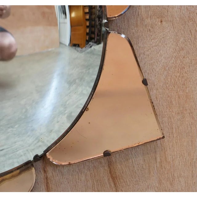 Absolutely sublime peach glass Art Deco Convex wall mirror with petal trim This mirror is one of three very rare Art Deco...