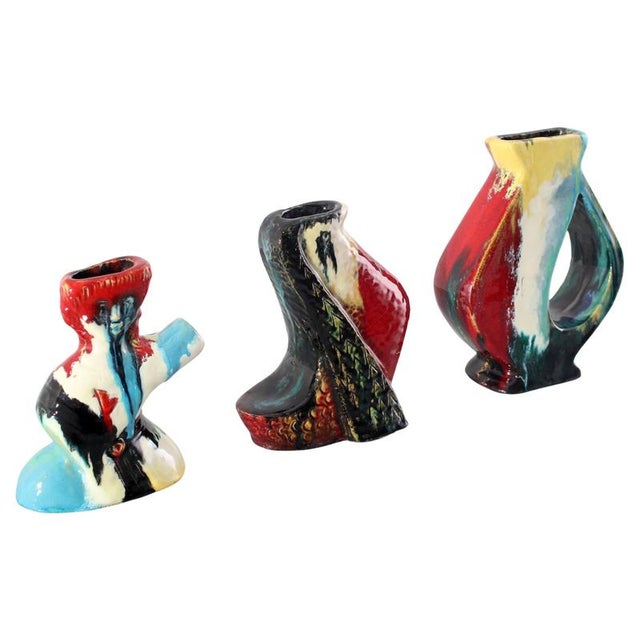 Set of three hand-glazed polychrome ceramic vases by Angelo Minghetti, signed "Minghetti Bologna" on the bottom, Italy,...