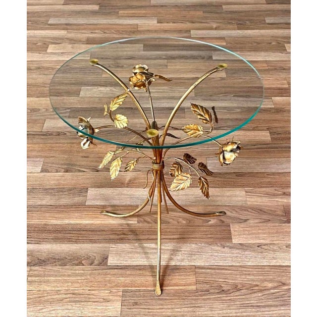 Hollywood Regency Glamour! This whimsical vintage side table dates from the 1960s. Base is comprised of gilt-finished...