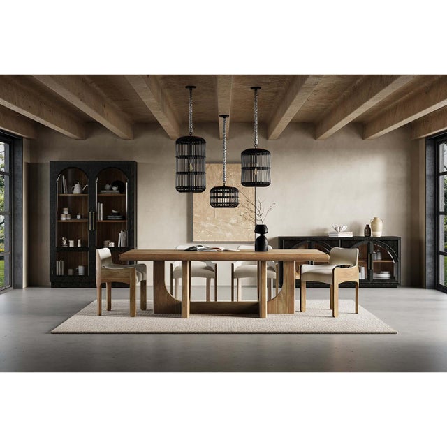 Finished in a vintage black and featuring a charming straw wash interior. This cabinet serves as a striking focal point in...