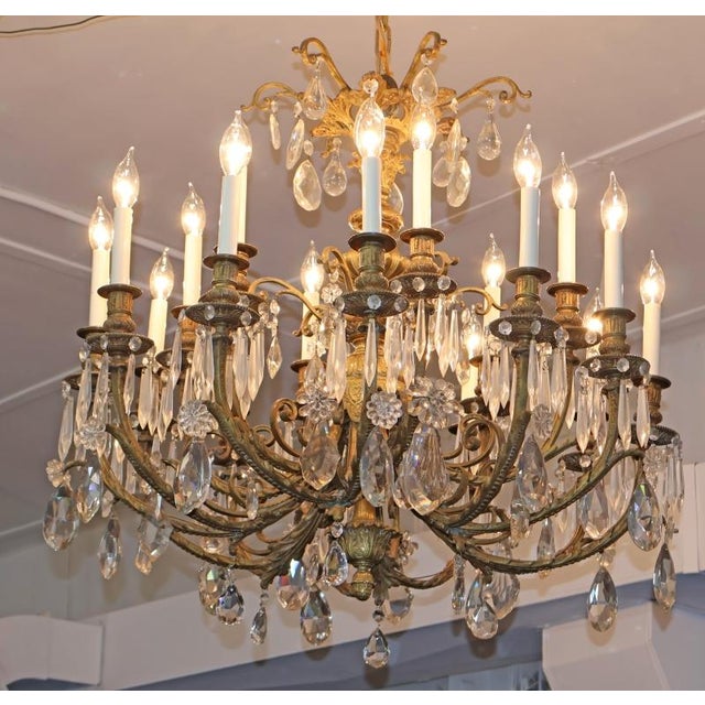 Early 20th Century French Louis XV Style Bronze and Crystal Chandlier 30 X 30 Dimensions : 30" Tall X 30" Wide X 30" Deep...