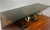 This coffee table features a distinctive design with elephant bases, which draws inspiration from Asian art and culture....