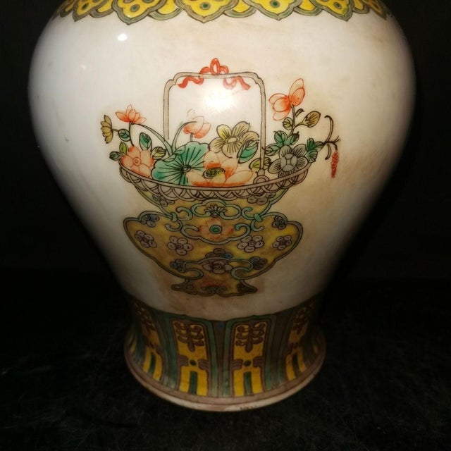 Add a touch of classic Chinoiserie charm to your space with this beautiful vintage Famille Rose lidded ginger jar. This...