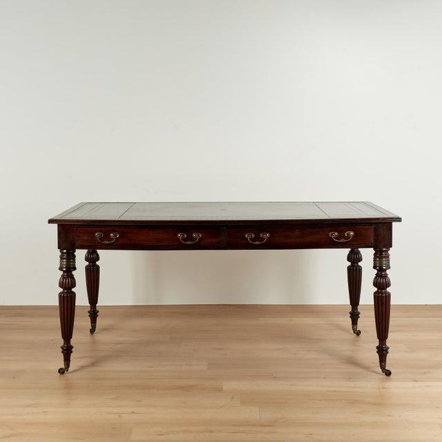 Handsome 19th century William IV library table, desk with the original tooled lush brown leather top on a two drawer case...