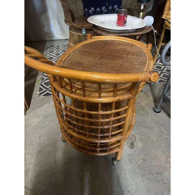 Up for consideration is a beautiful vintage Boho bamboo bar cart. This would look lovely in your home and it is a perfect...